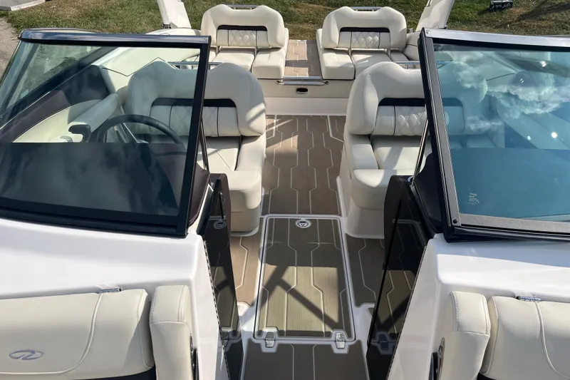 Slide: The Image of 2025 Regal LS4 boat interior with luxurious seating and modern design. - 9