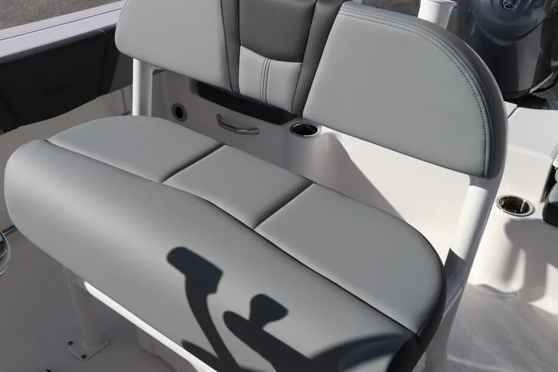 Slide: The Image of 2025 Robalo R200 Center Console boat seat, gray upholstery, modern design. - 21