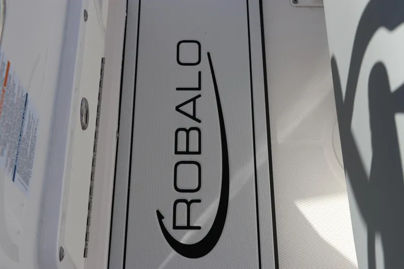 Slide: The Image of 2025 Robalo R200 Center Console boat logo on deck. - 22