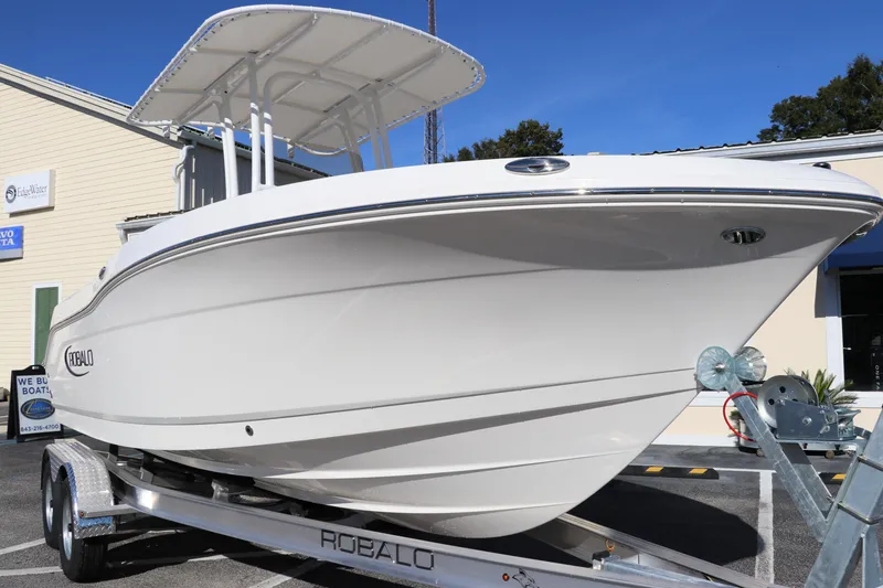 Slide: The Image of 2025 Robalo R200 Center Console boat on trailer, side view. - 3