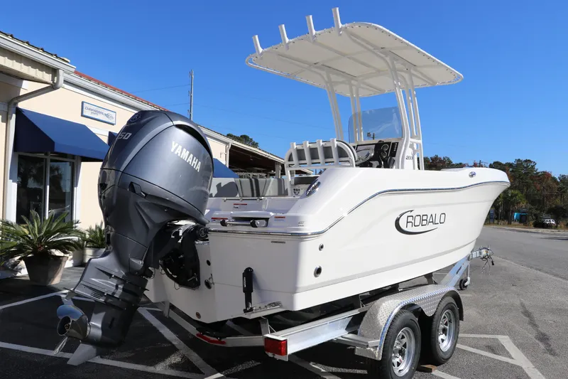 Slide: The Image of 2025 Robalo R200 Center Console boat with Yamaha engine on trailer. - 5