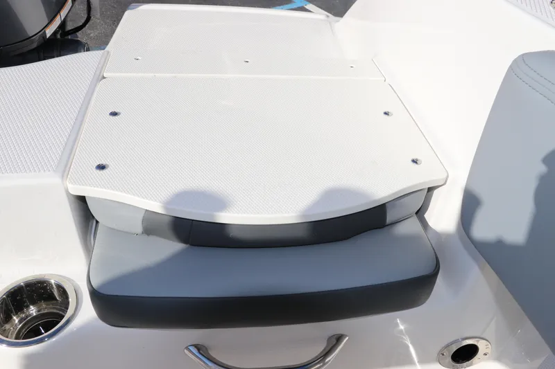 Slide: The Image of 2025 Robalo R200 Center Console boat seat with storage compartment. - 9