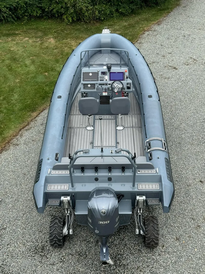 Slide: The Image of 2019 Sealegs 9M Hydrosol amphibious boat on gravel path. - 10