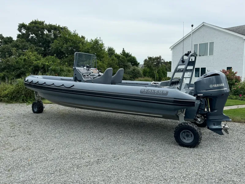 Slide: The Image of 2019 Sealegs 9M Hydrosol amphibious boat parked on gravel. - 14