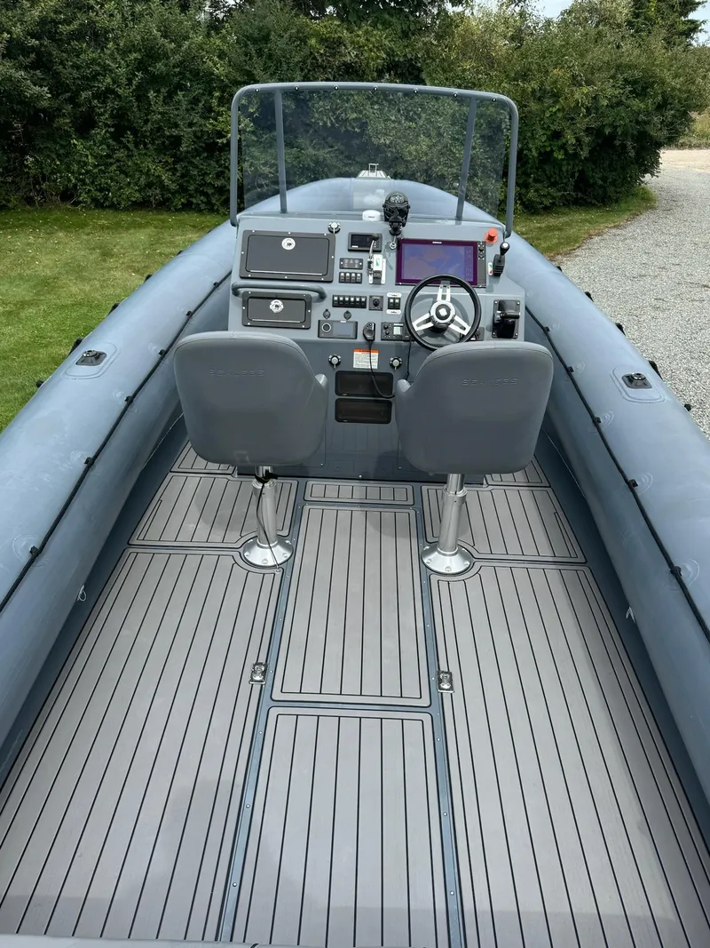Slide: The Image of Interior view of a 2019 Sealegs 9M Hydrosol boat with control console. - 23