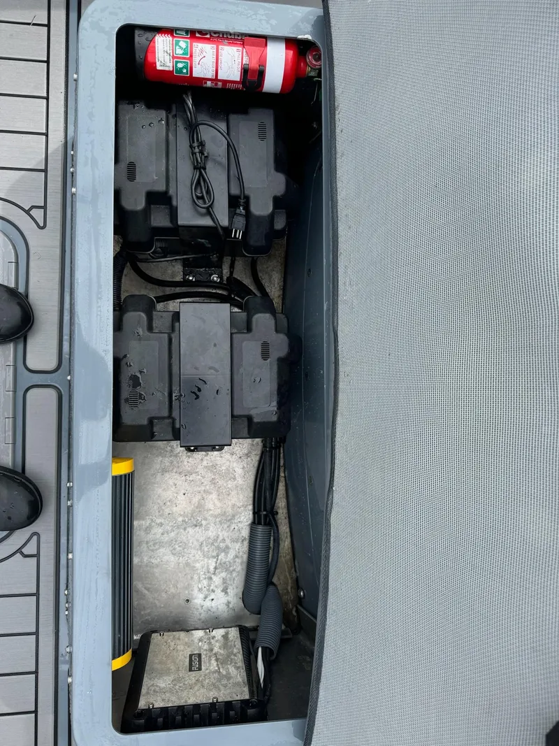 Slide: The Image of Sealegs 9M Hydrosol 2019 battery compartment with fire extinguisher. - 34