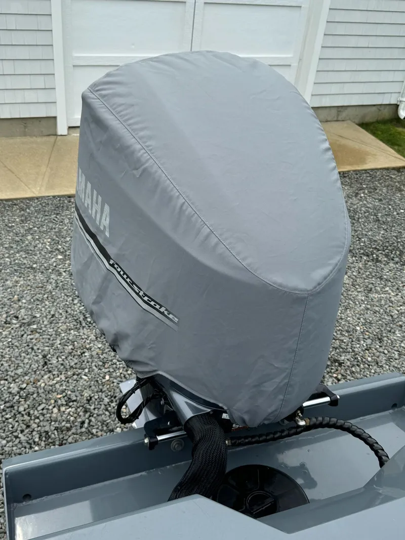 Slide: The Image of Yamaha outboard motor with gray cover on Sealegs 9M Hydrosol 2019. - 6