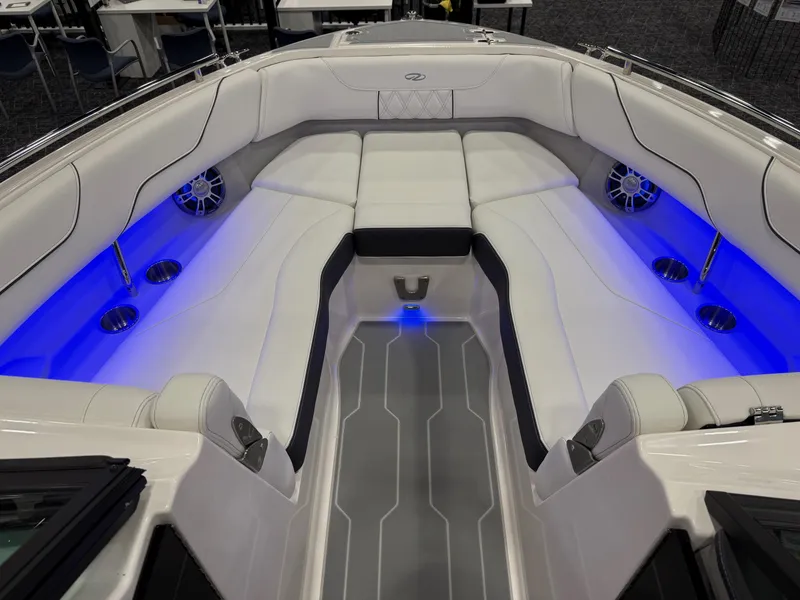 The Image of 2025 Regal LS6 boat on trailer at Hern Marine dealership under a sunny sky. - 1