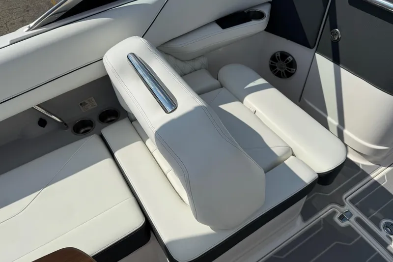 Slide: The Image of 2025 Regal LS6 boat interior with luxurious white seating and modern design elements. - 16