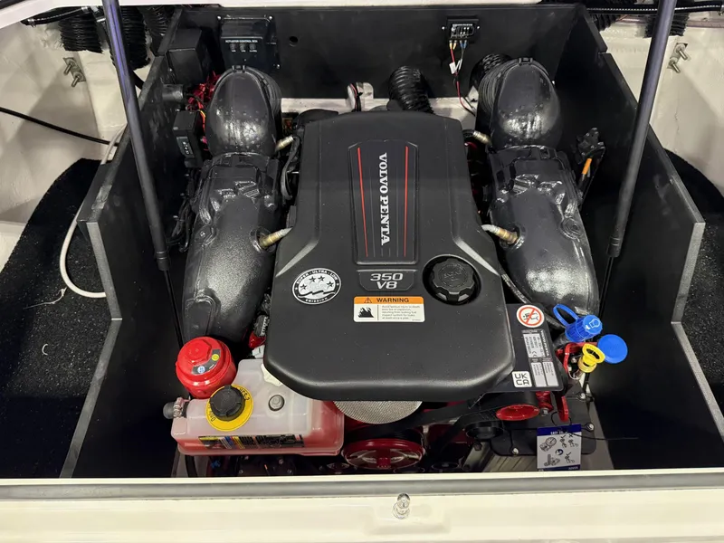 Slide: The Image of 2025 Regal LS6 boat interior bathroom with modern fixtures and compact design. - 9