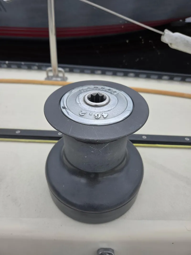 Slide: The Image of Aerial view of a 1985 S2 9.1 sailboat on the water. - 10