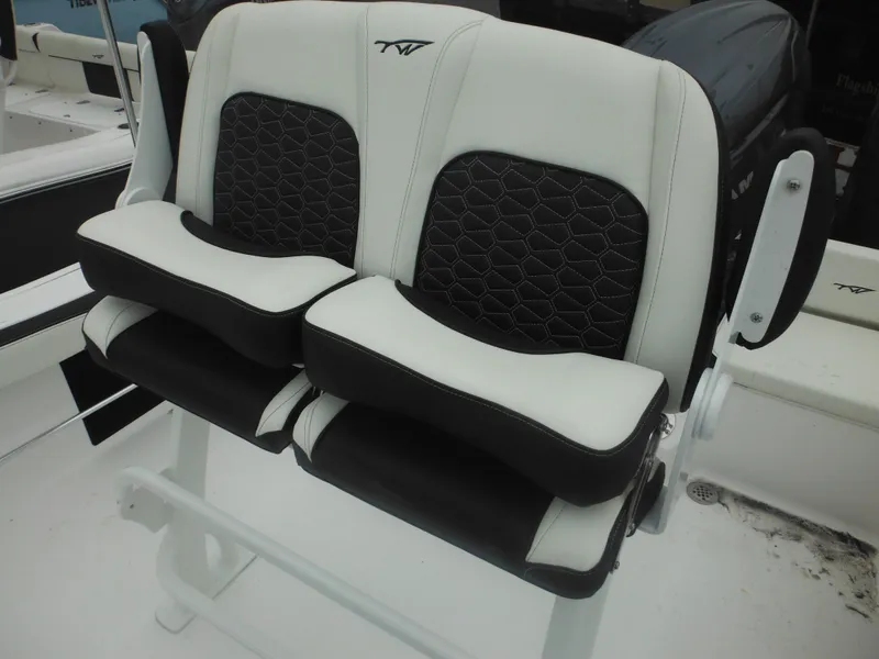 Slide: The Image of 2025 Tidewater 198 CC Adventure boat seats, black and white design, comfortable and stylish. - 12