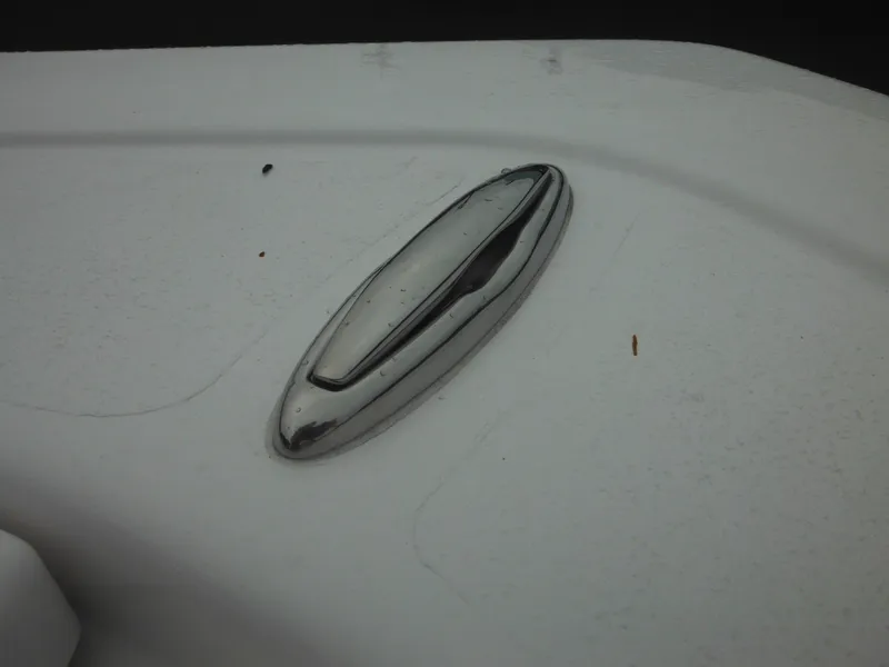 Slide: The Image of Close-up of 2025 Tidewater 198 CC Adventure boat cleat on white surface. - 20