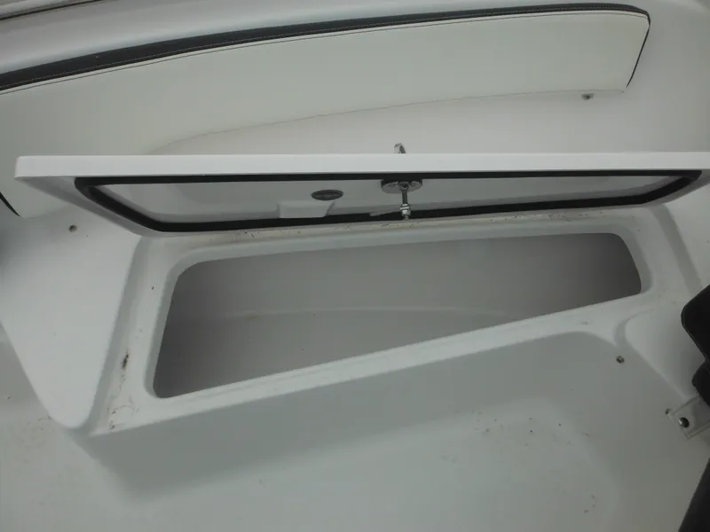 Slide: The Image of Open storage compartment on 2025 Tidewater 198 CC Adventure boat. - 25