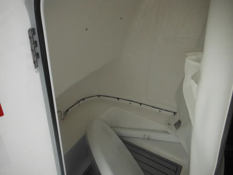 Slide: The Image of 2025 Tidewater 198 CC Adventure boat interior storage compartment. - 31