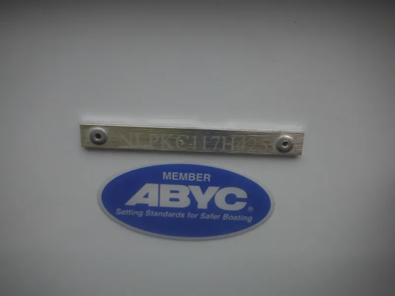 Slide: The Image of ABYC member plaque on 2025 Tidewater 198 CC Adventure boat. - 38