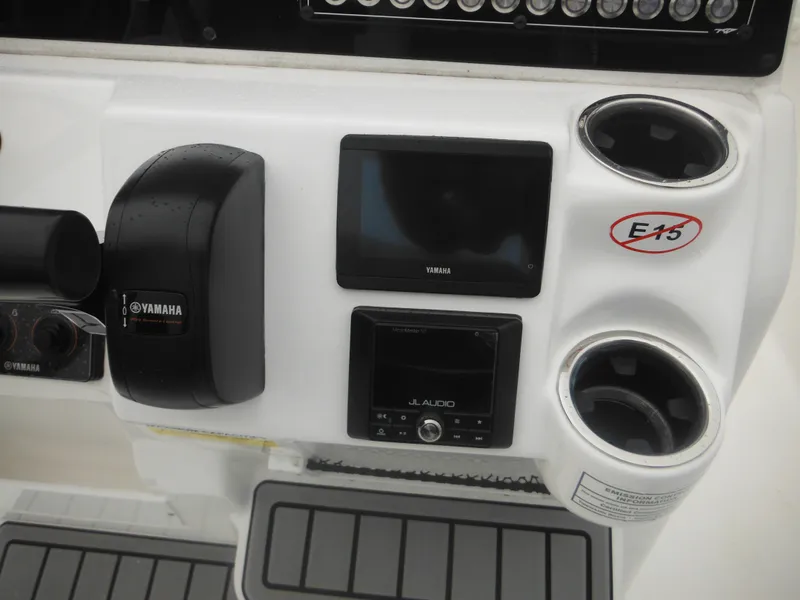 Slide: The Image of 2025 Tidewater 198 CC Adventure boat dashboard with Yamaha controls and electronics. - 9