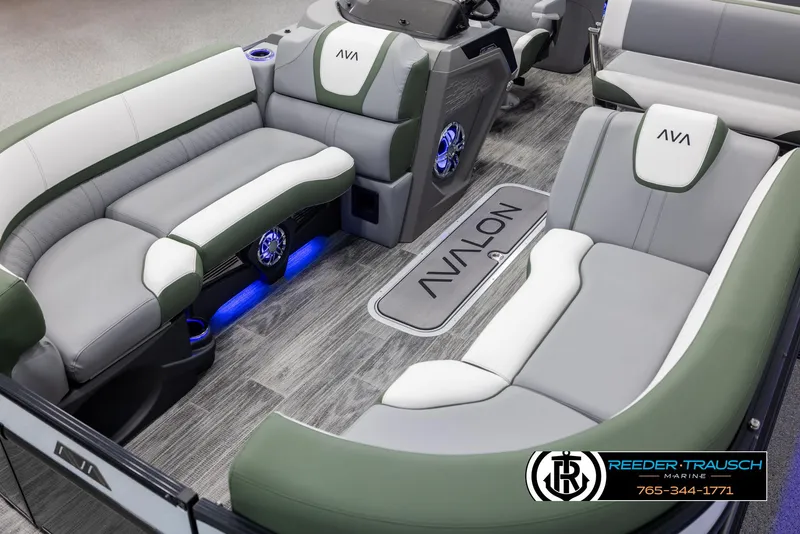 Slide: The Image of 2025 Avalon Catalina Entertainer boat interior with modern seating and ambient lighting. - 10
