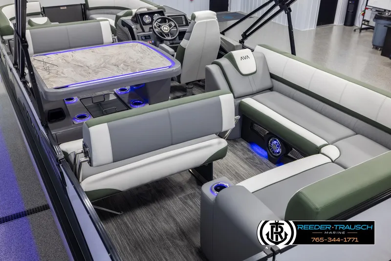 Slide: The Image of 2025 Avalon Catalina Entertainer boat interior with luxurious seating and LED lighting. - 11