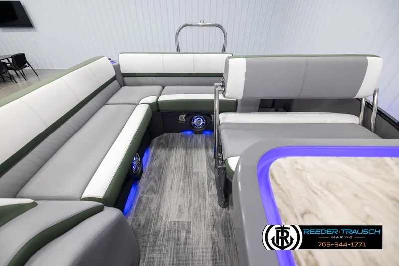 Slide: The Image of Luxurious 2025 Avalon Catalina Entertainer boat interior with modern seating and ambient lighting. - 15