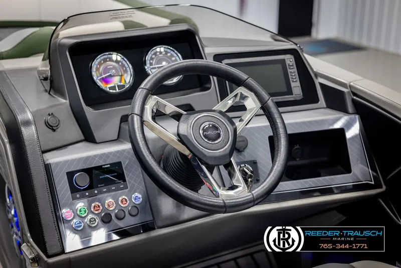 Slide: The Image of 2025 Avalon Catalina Entertainer dashboard with steering wheel and control panel. - 25