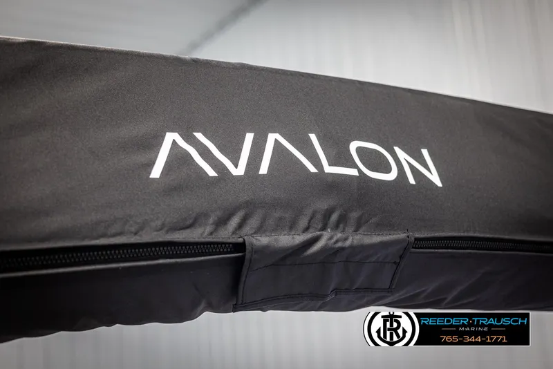 Slide: The Image of Avalon Catalina Entertainer 2025 boat cover with logo and Reeder-Trausch Marine contact details. - 33