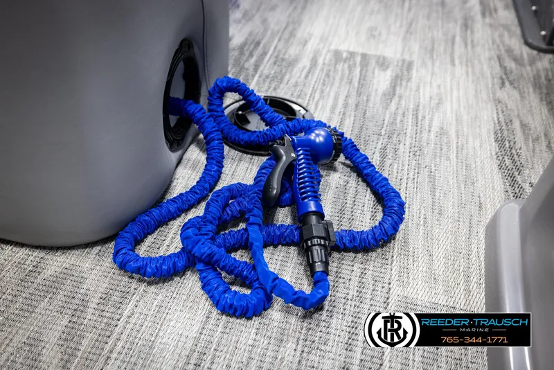 Slide: The Image of Blue coiled hose on Avalon Catalina Entertainer 2025 boat floor. - 40