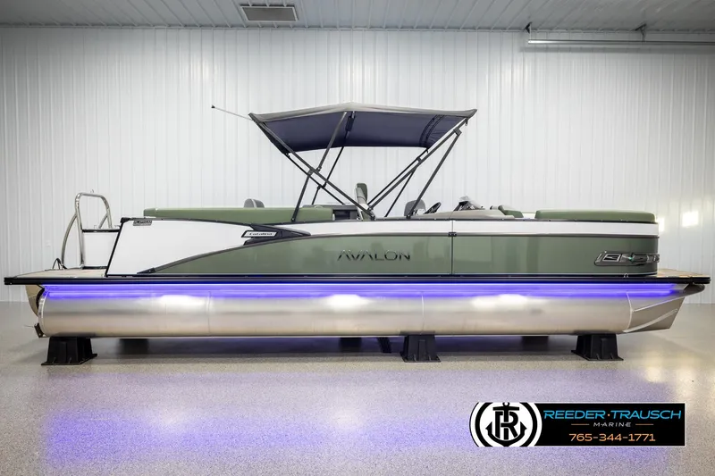 Slide: The Image of 2025 Avalon Catalina Entertainer pontoon boat with canopy and blue underglow lighting. - 5