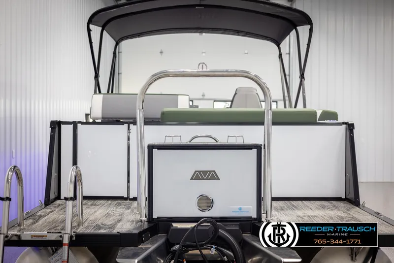 Slide: The Image of 2025 Avalon Catalina Entertainer boat, rear view, in showroom setting. - 7