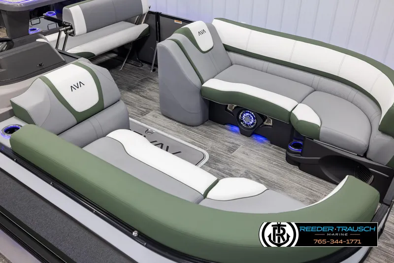 Slide: The Image of 2025 Avalon Catalina Entertainer boat interior with green and white seating, blue LED lights. - 9