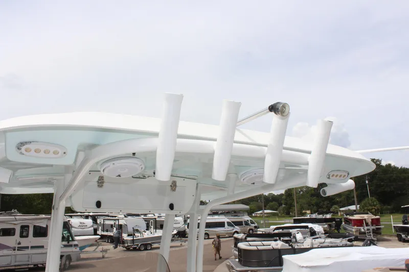 Slide: The Image of 2015 Sea Hunt Ultra 235 SE boat roof with rod holders and lights. - 16