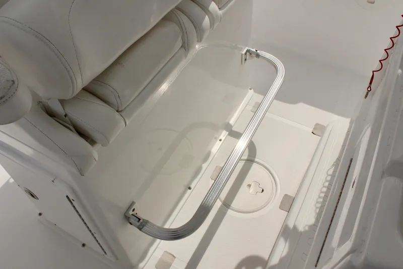 Slide: The Image of 2015 Sea Hunt Ultra 235 SE boat interior with footrest and seating. - 24