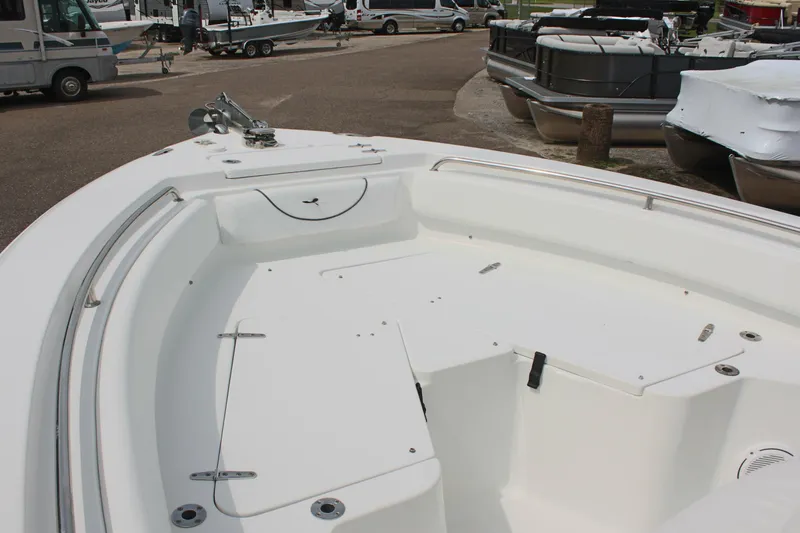 Slide: The Image of 2015 Sea Hunt Ultra 235 SE boat interior, spacious deck view. - 27