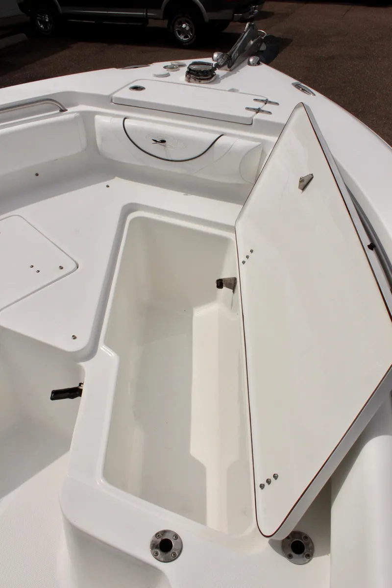 Slide: The Image of 2015 Sea Hunt Ultra 235 SE boat storage compartment, open and spacious design. - 30