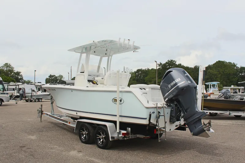 Slide: The Image of 2015 Sea Hunt Ultra 235 SE boat on trailer with Yamaha outboard motor. - 7