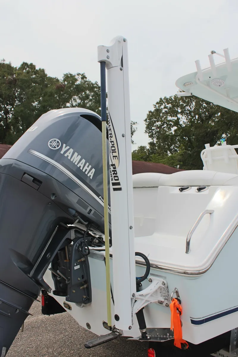 Slide: The Image of 2015 Sea Hunt Ultra 235 SE boat with Yamaha outboard motor and Power-Pole anchor. - 9