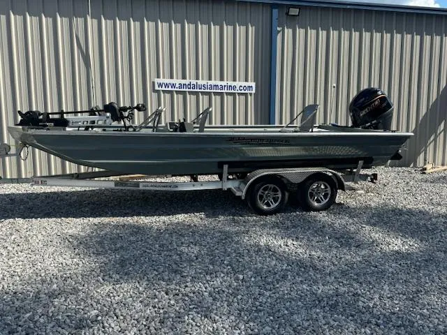 The Image of 2025 Custom Ultimate Panfish XL boat on trailer, parked outside Andalusia Marine. - 0