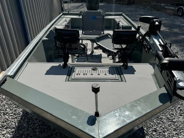 Slide: The Image of Custom Ultimate Panfish XL 2025 fishing boat with dual seats and measuring board. - 26