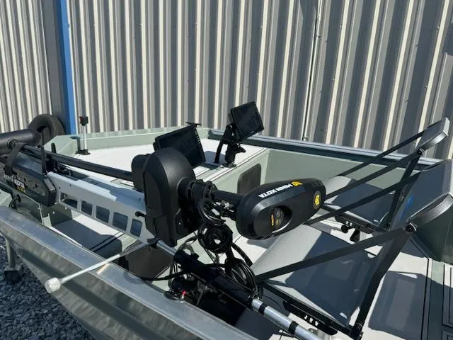 Slide: The Image of Custom Ultimate Panfish XL 2025 boat with advanced fishing equipment and motor. - 27