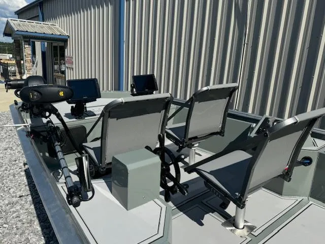 Slide: The Image of Custom Ultimate Panfish XL 2025 boat with seating and fishing equipment. - 28