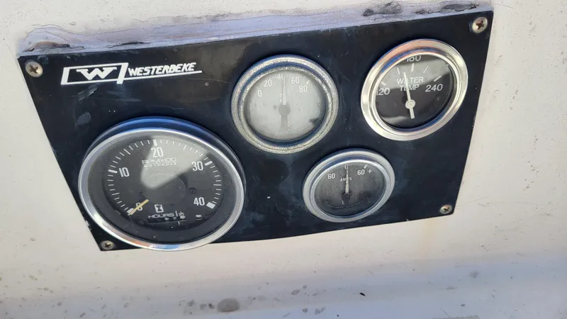 Slide: The Image of Westerbeke engine gauges on a 1979 Pearson 365 Sloop sailboat. - 14