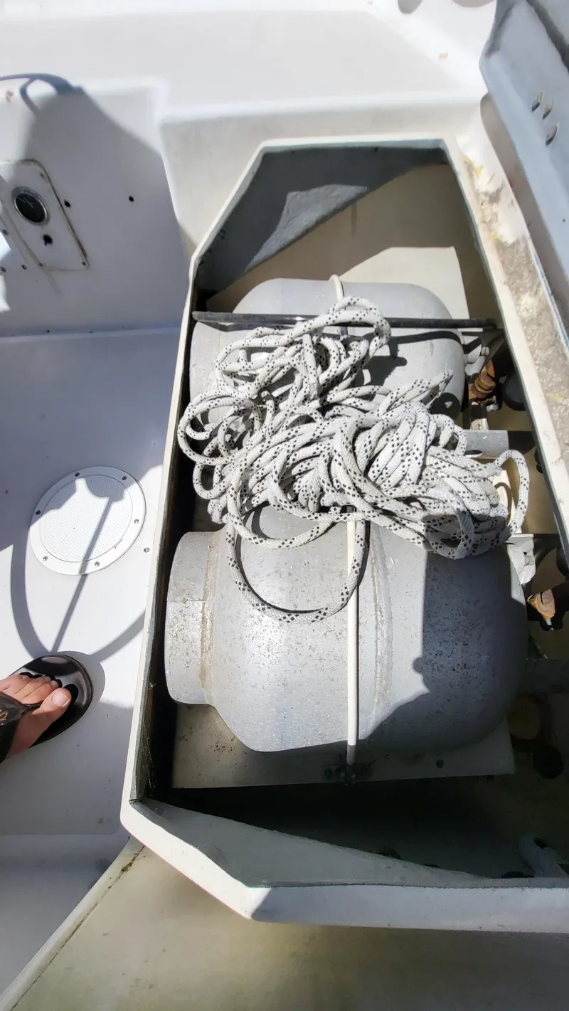 Slide: The Image of Rope and equipment in storage compartment of 1979 Pearson 365 Sloop. - 28