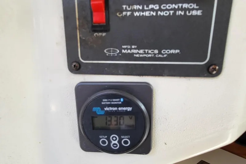 Slide: The Image of Victron Energy battery monitor and LPG control on 1979 Pearson 365 Sloop. - 39