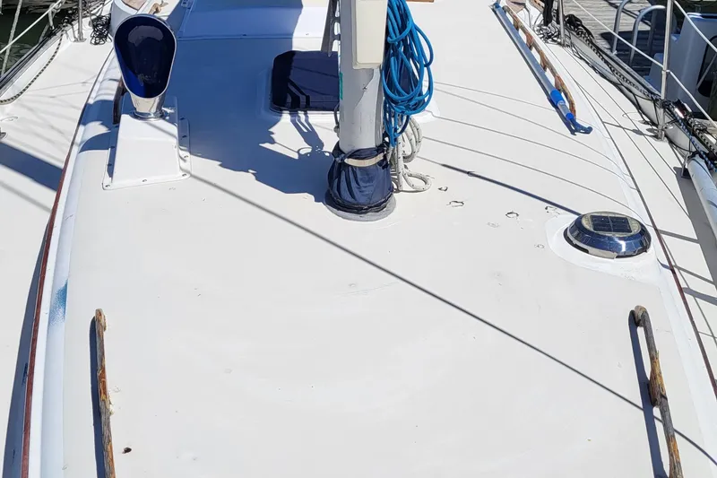 Slide: The Image of 1979 Pearson 365 Sloop deck with mast and rigging, docked at marina. - 9