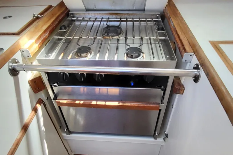 Slide: The Image of 1979 Pearson 365 Sloop kitchen with stainless steel stove and oven. - 11