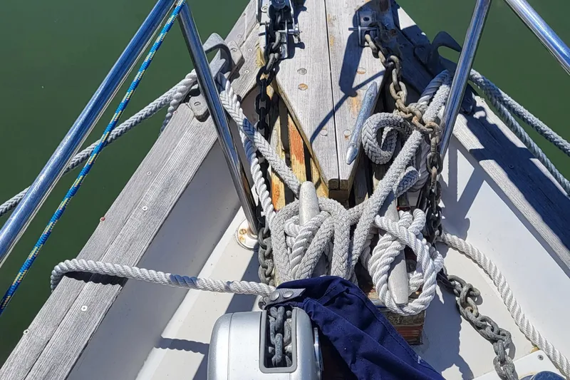 Slide: The Image of Deck of 1979 Pearson 365 Sloop with ropes and chains. - 30