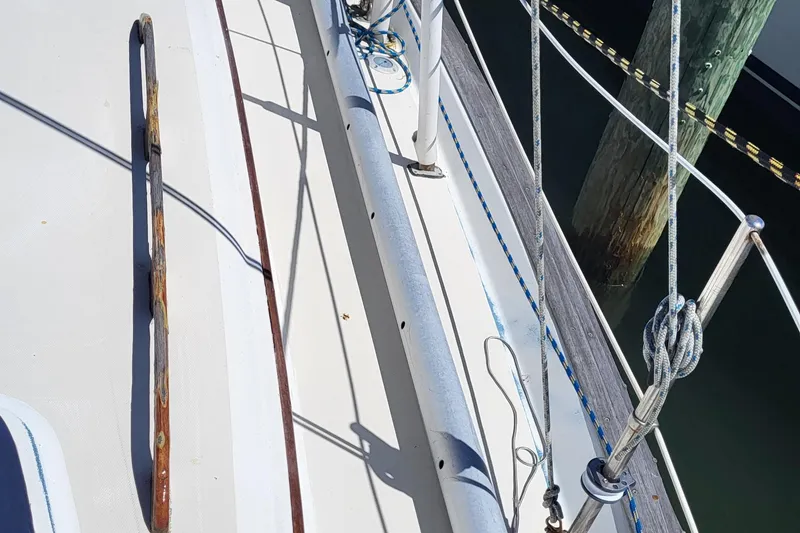 Slide: The Image of 1979 Pearson 365 Sloop deck with railing and rigging details. - 8