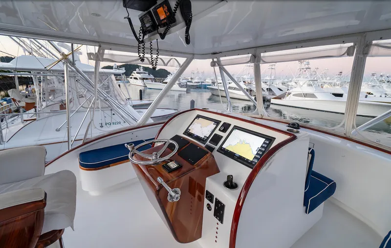 Slide: The Image of Helm of 2025 Maverick Yachts Costa Rica 50, featuring modern navigation equipment and luxurious seating. - 4