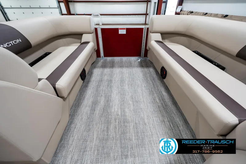 Slide: The Image of 2025 Bennington 21 SLS boat interior with beige seating and carpeted floor. - 17