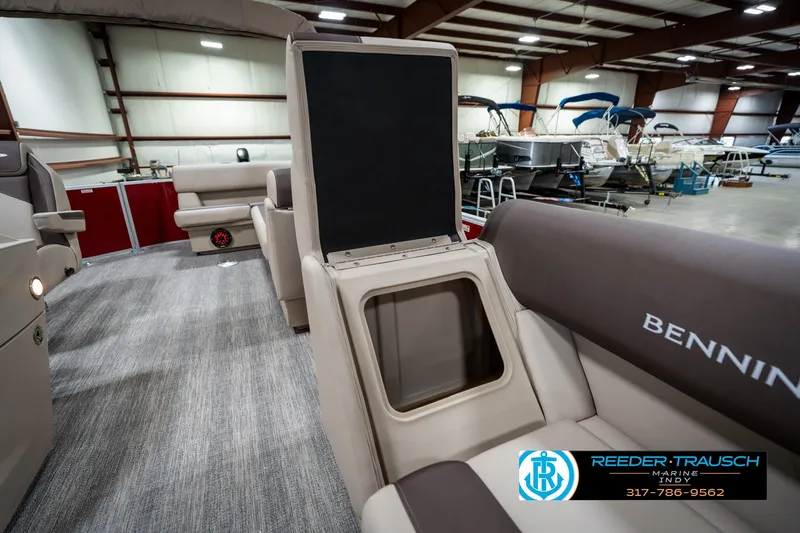 Slide: The Image of 2025 Bennington 21 SLS boat interior with storage compartment in showroom. - 20